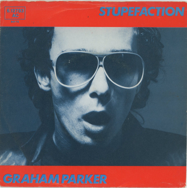 Cover Graham Parker - Stupefaction (7, Single, Promo) Schallplatten Ankauf