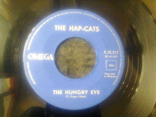 Cover The Hap-Cats* -  The Hungry Eye / Raindrops (7, Single) Schallplatten Ankauf