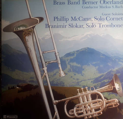 Cover Brass Band Berner Oberland Conductor Markus S. Bach Guest Soloists Phillip McCann, Branimir Slokar - Brass Band Berner Oberland (LP) Schallplatten Ankauf