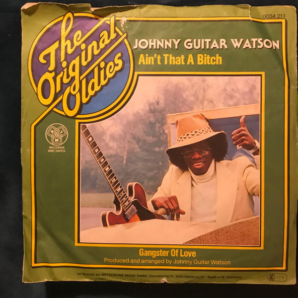 Cover Johnny Guitar Watson - Ain't That A Bitch / Gangster Of Love (7) Schallplatten Ankauf