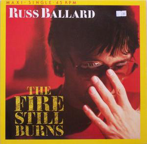 Cover Russ Ballard - The Fire Still Burns (12, Maxi) Schallplatten Ankauf