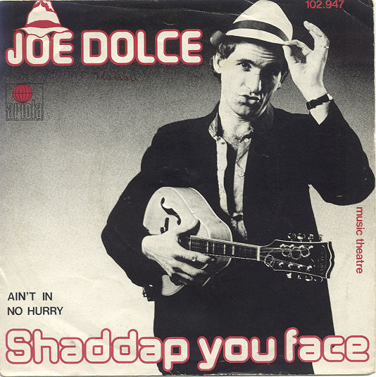 Cover Joe Dolce Music Theatre - Shaddap You Face (7, Single) Schallplatten Ankauf