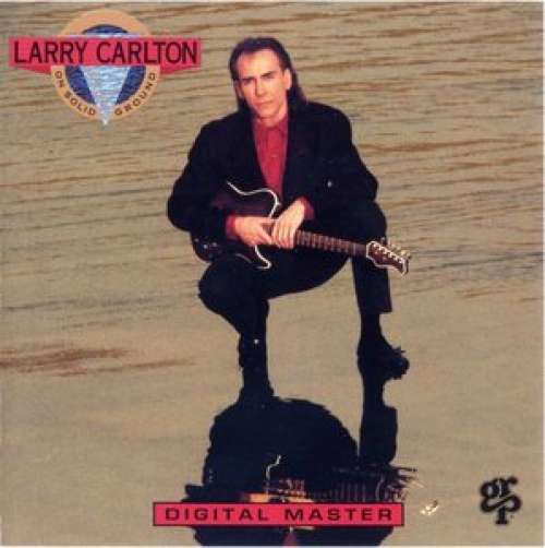 Cover Larry Carlton - On Solid Ground (LP, Album) Schallplatten Ankauf