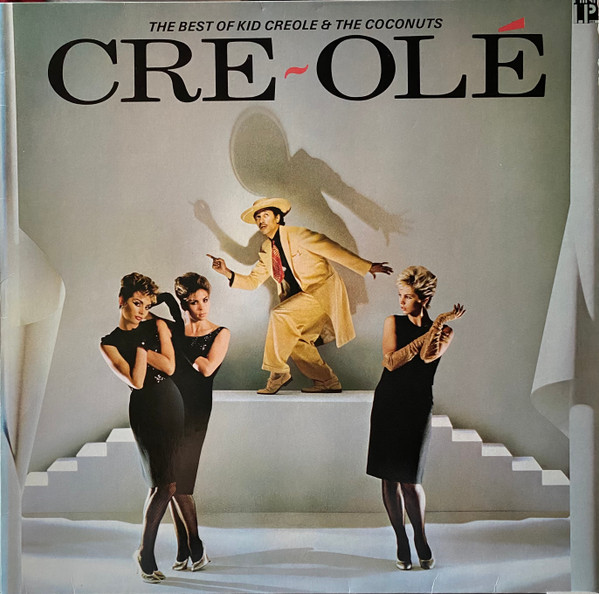 Cover Kid Creole And The Coconuts - Cre~Olé - The Best Of Kid Creole And The Coconuts (LP, Comp) Schallplatten Ankauf