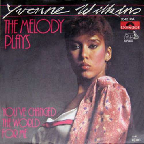 Cover Yvonne Wilkins - The Melody Plays (7, Single) Schallplatten Ankauf