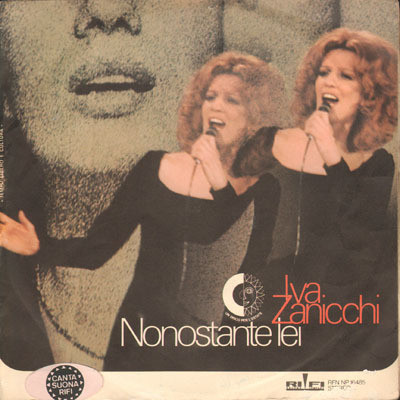Cover Iva Zanicchi - Nonostante Lei (7) Schallplatten Ankauf
