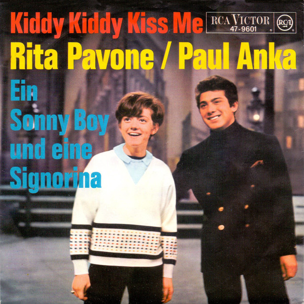 Cover Rita Pavone - Paul Anka - Kiddy, Kiddy Kiss Me / Ein Sunny-Boy Und Eine Signorina (7, Single) Schallplatten Ankauf