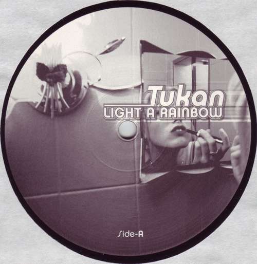 Cover Tukan - Light A Rainbow (Part 1) (12) Schallplatten Ankauf