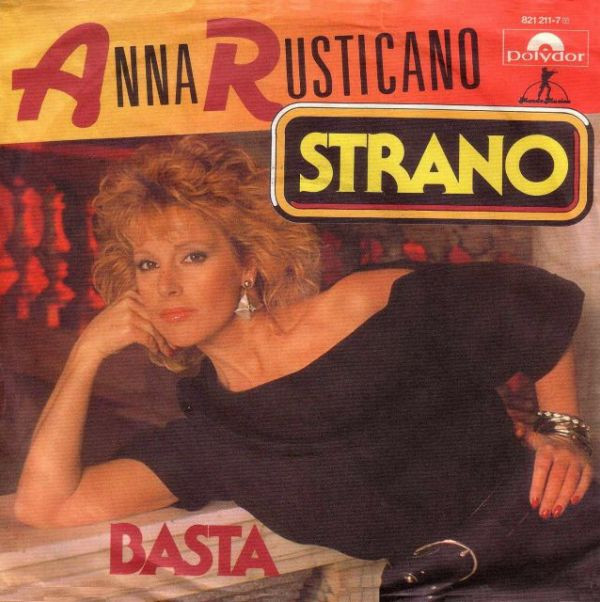 Cover Anna Rusticano - Strano / Basta (7, Single) Schallplatten Ankauf