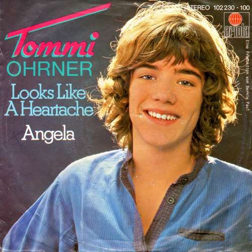 Cover Tommi Ohrner - Looks Like A Heartache  (7, Single) Schallplatten Ankauf