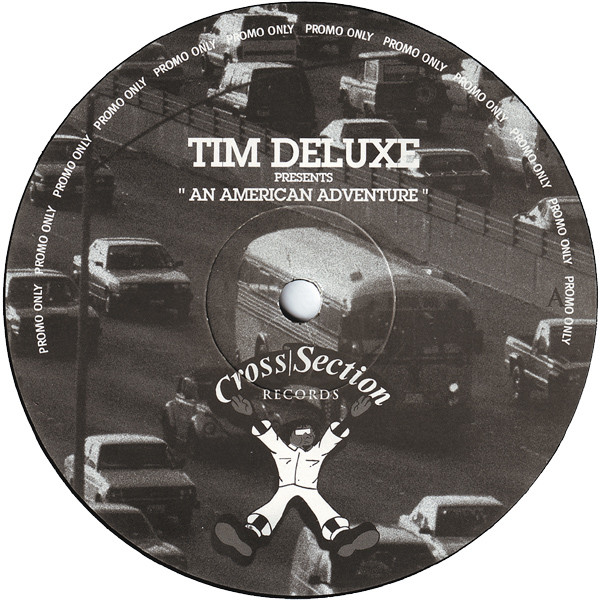 Cover Tim Deluxe - An American Adventure (12, Promo) Schallplatten Ankauf