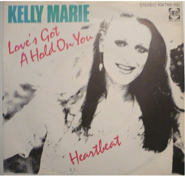 Cover Kelly Marie - Love's Got A Hold On You / Heartbeat (7, Single) Schallplatten Ankauf