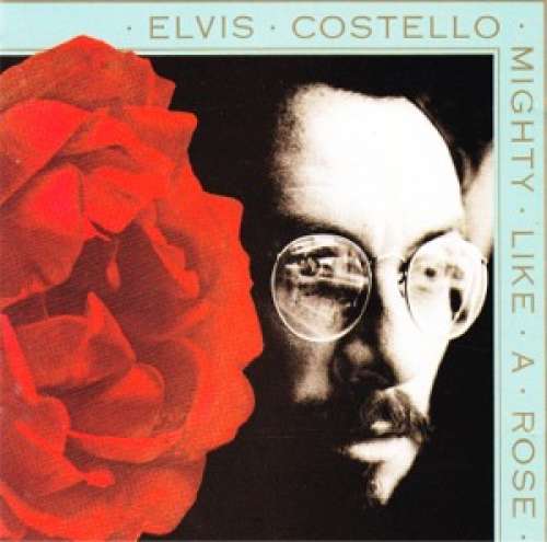Cover Elvis Costello - Mighty Like A Rose (CD, Album) Schallplatten Ankauf