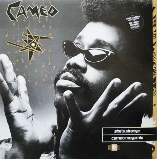 Cover Cameo - She's Strange / Cameo Megamix (12, Single) Schallplatten Ankauf