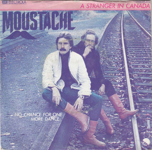 Cover Moustache (5) - A Stranger In Canada (7, Single) Schallplatten Ankauf