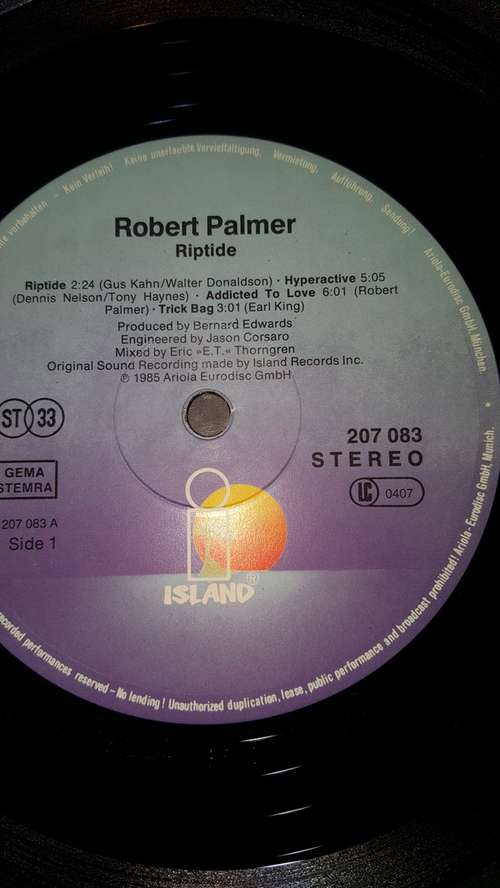 Cover Robert Palmer - Riptide (LP, Album) Schallplatten Ankauf