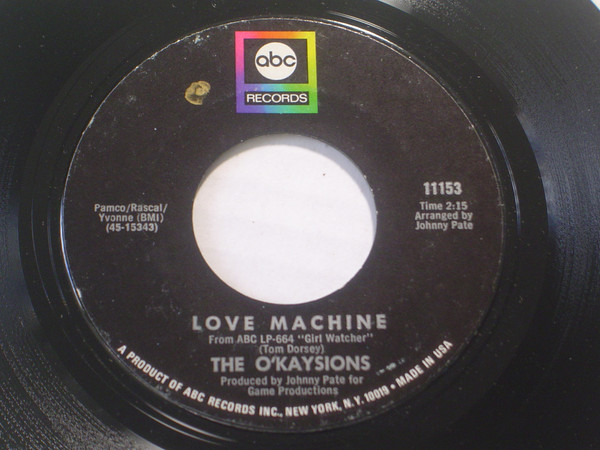 Cover The O'Kaysions - Love Machine / Dedicated To The One I Love (7, Single) Schallplatten Ankauf
